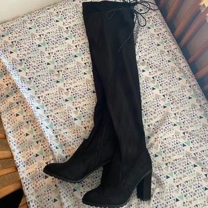 Thigh high black boots